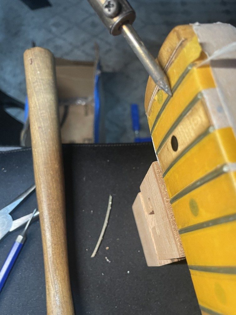 Controlled fret removal with localized heat on 1972 Fender maple neck