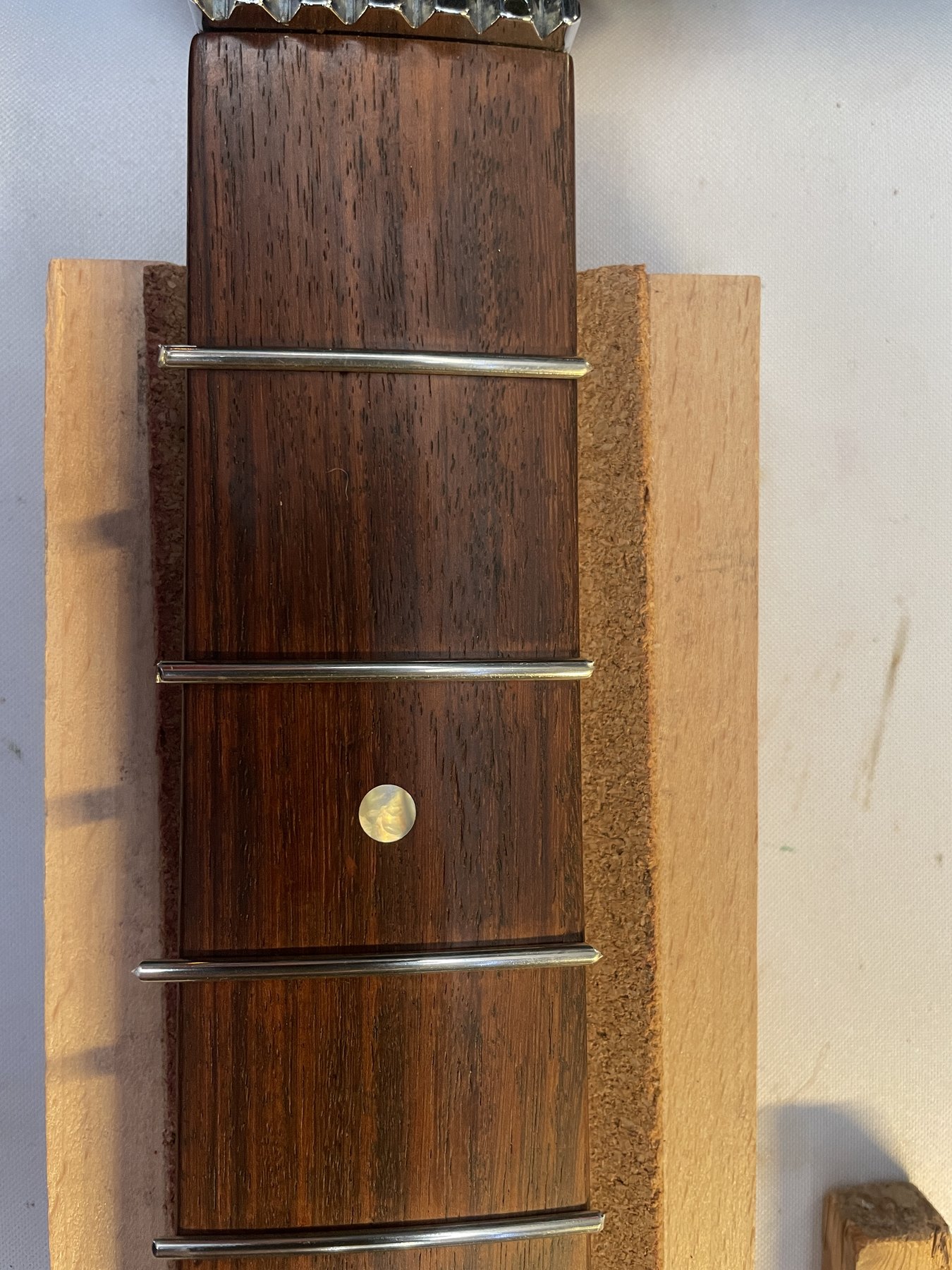Jescar FW47104 fretwire staged and installed on the Yamaha Pacifica 921
