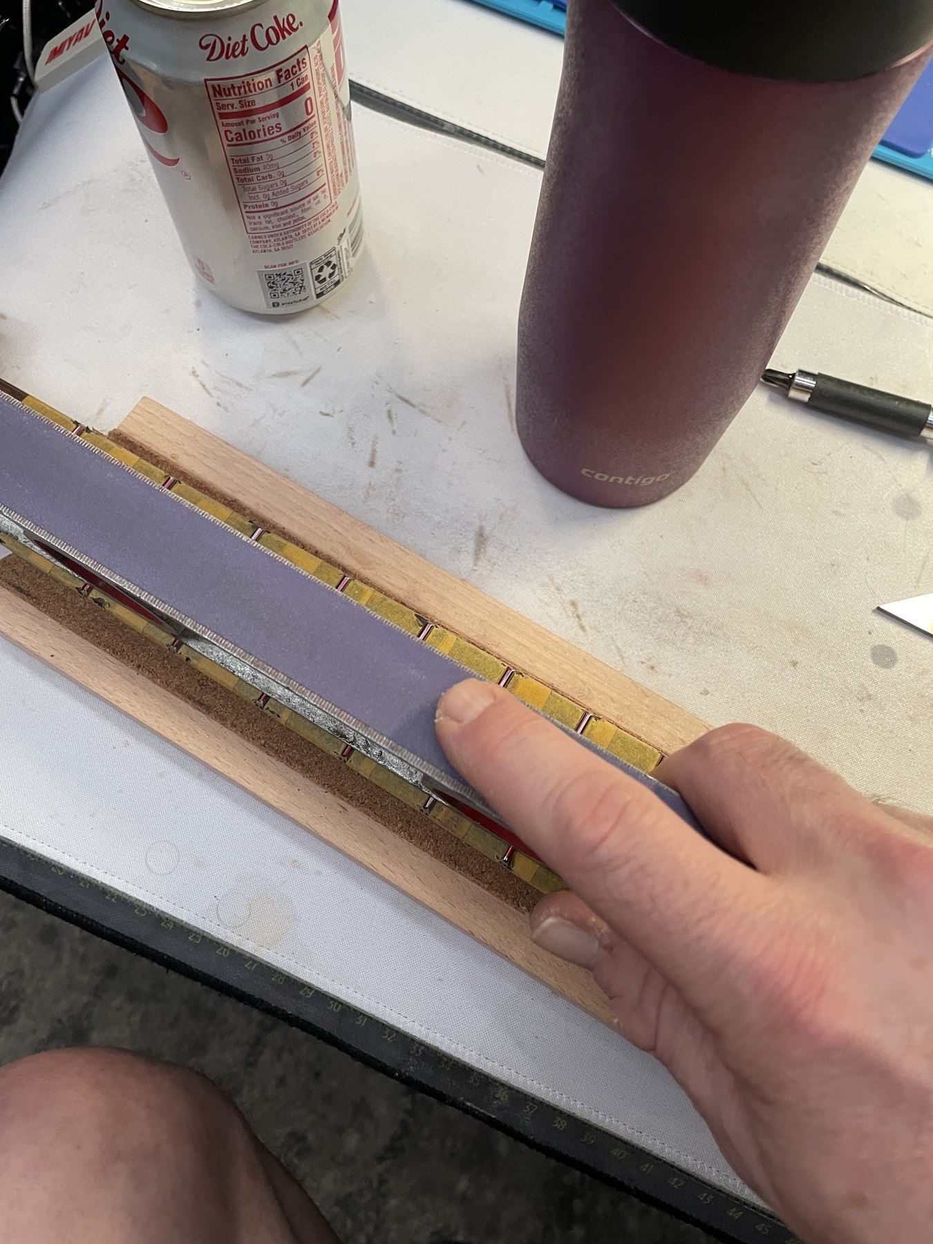 Leveling-beam passes across the marked Pacifica 921 fret field