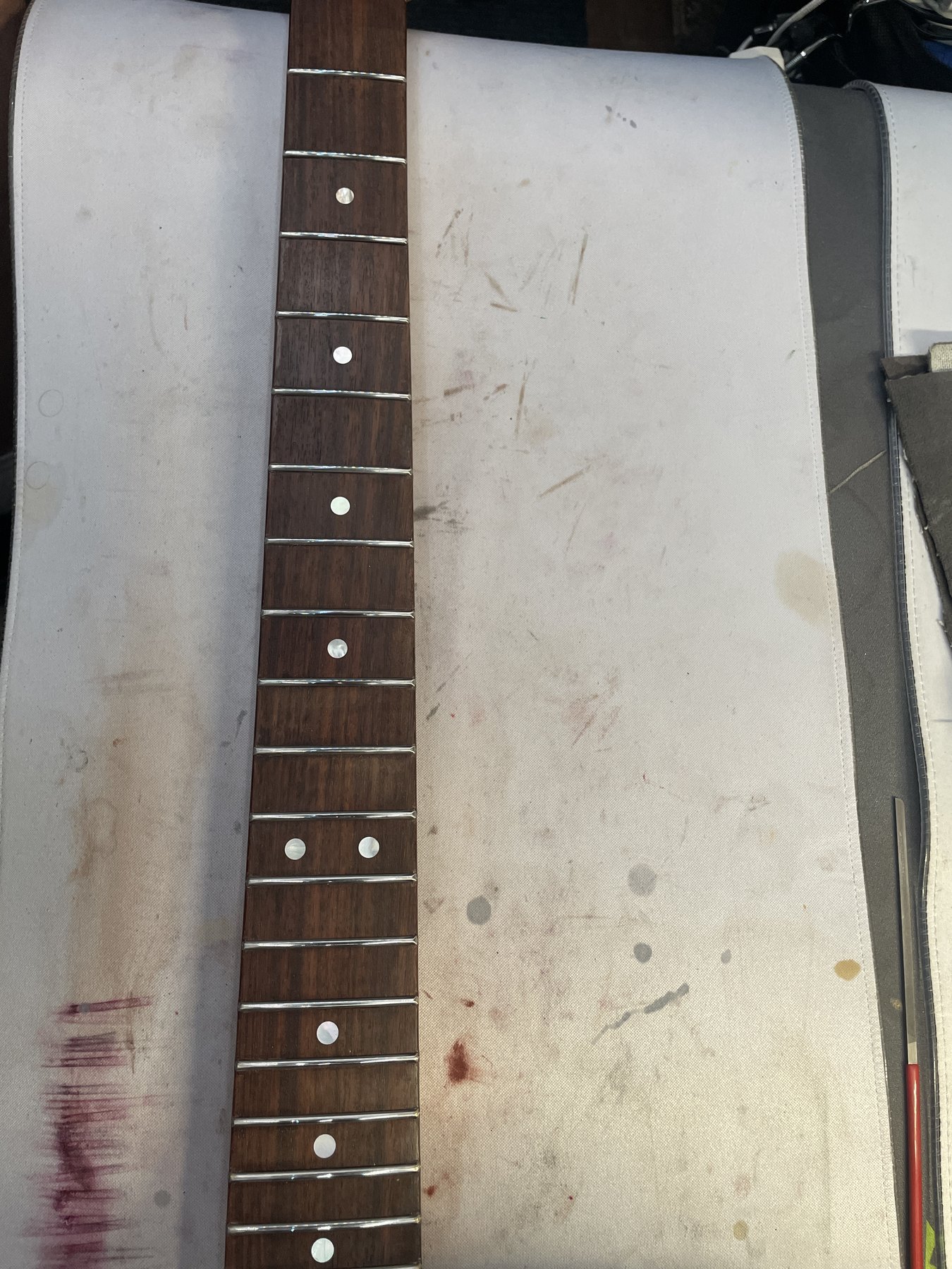 Finished Yamaha Pacifica 921 fretboard after dressing and polishing