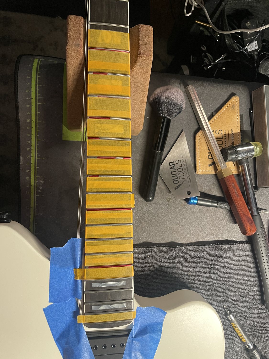Jim Root Jazzmaster fingerboard masked for fret correction